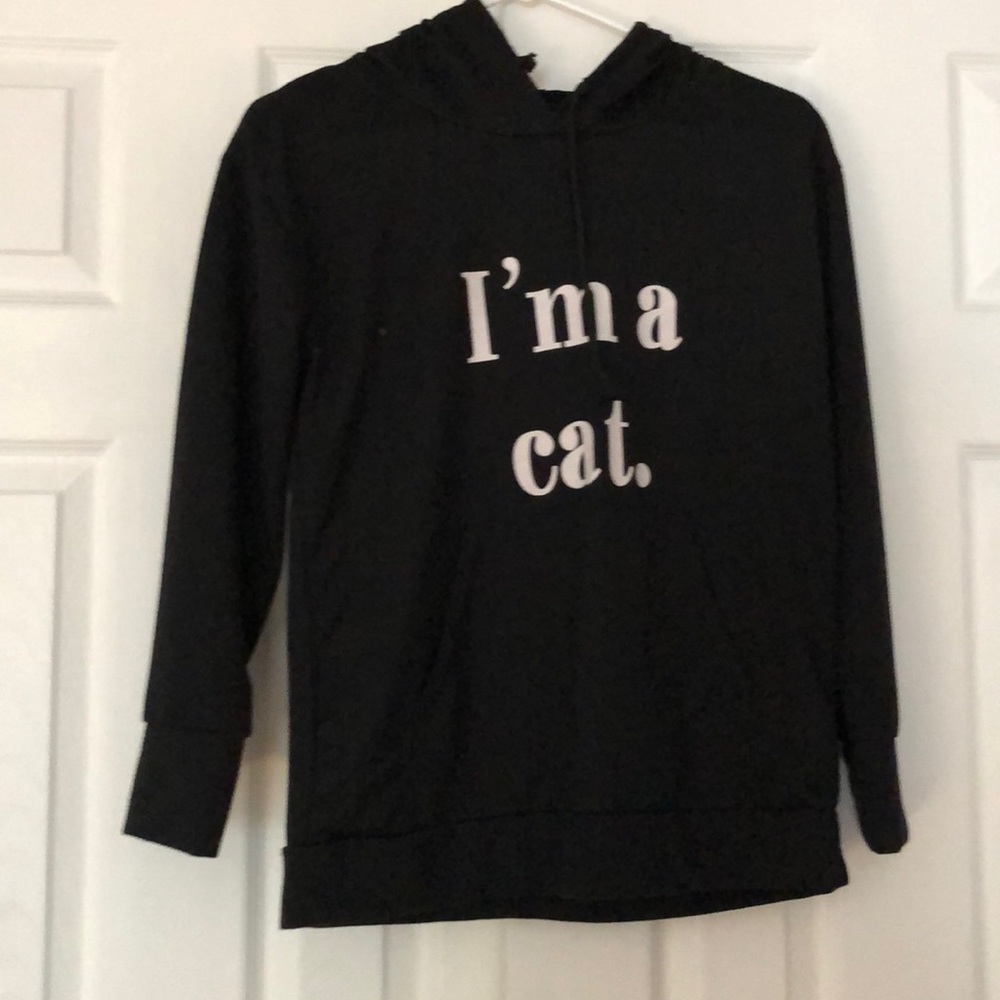 Black hoodie, cat ears on hood